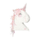 Piñata en forma de unicornio, con detalles holográficos.
