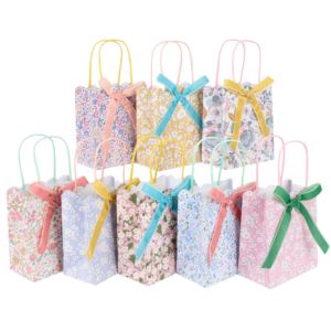 Bolsa de regalo de papel Meri Meri x Liberty con estampados florales exclusivos y lazos terciopelo
