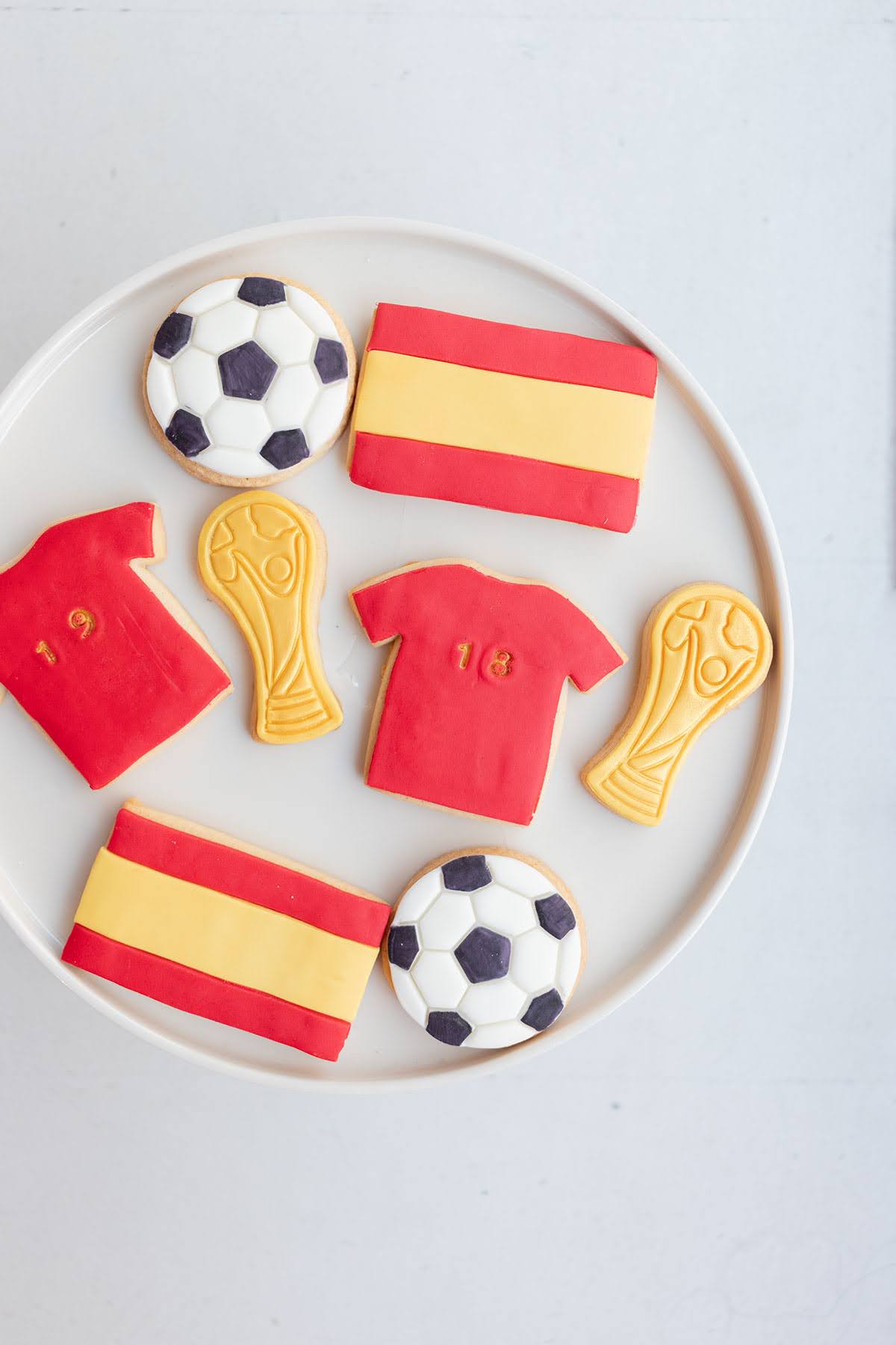 Galletas selección española Galletas inspiradas en la selección española de fútbol con camisetas, balones y banderas.